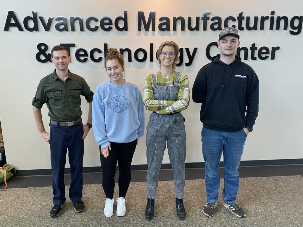 Four students standing next to each other: Jacob Weymeir, Sara Dzierzewski, Aspyn Koslowski and Andy Dionne.