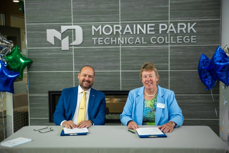 Moraine Park President Bonnie Baerwald and UW Oshkosh Chancellor Andy Leavitt smiling into the camera.