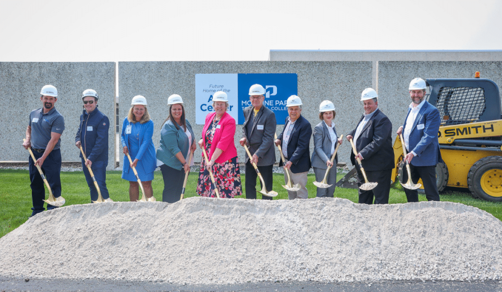 Donors with shovels breaking ground