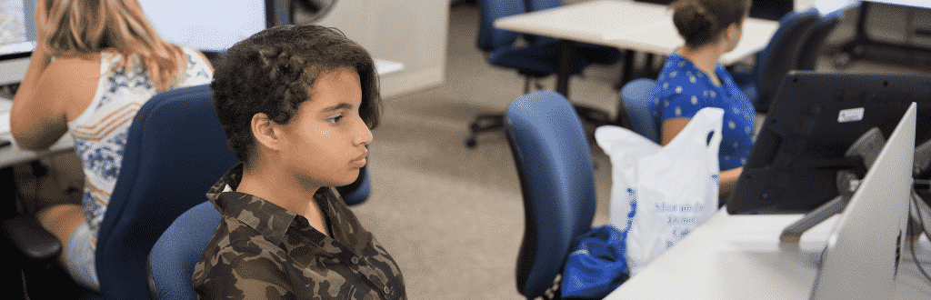 Young female student at computer.