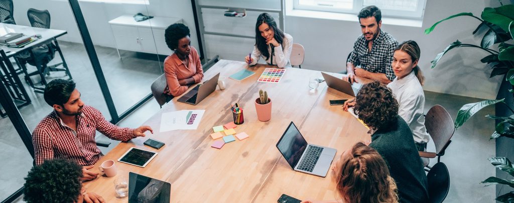 marketers sitting around a table