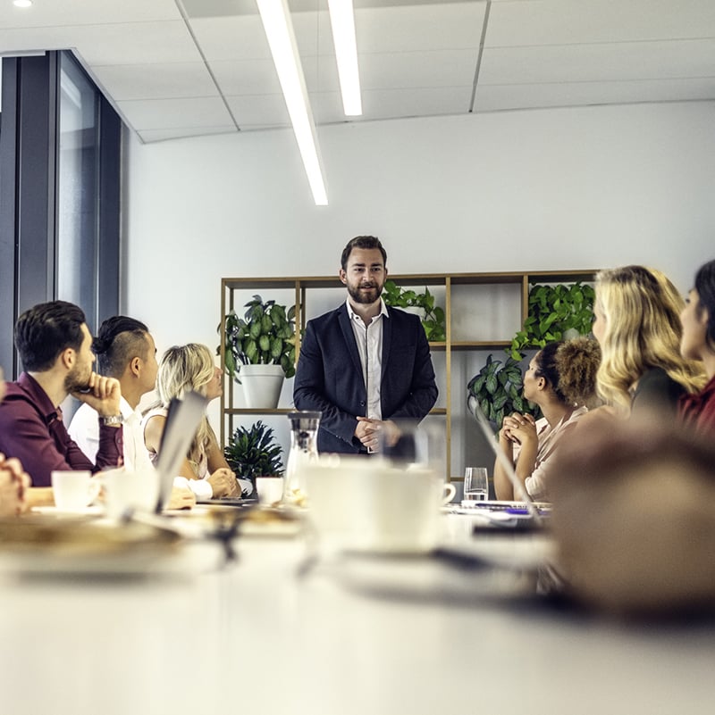 man speaking to group