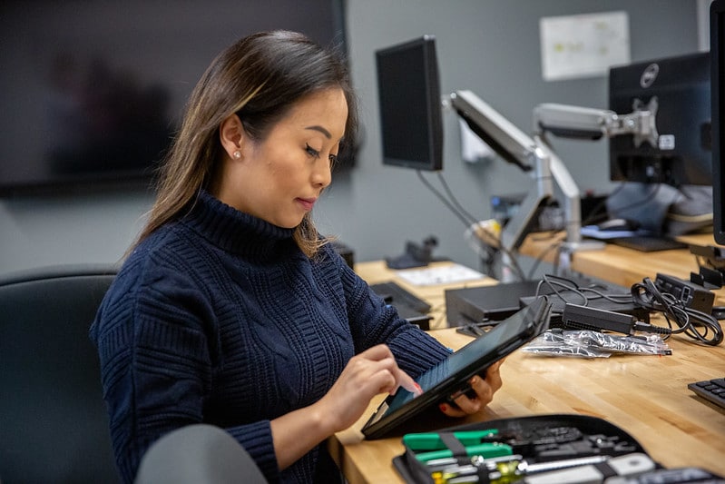 Student working with her tablet.