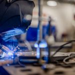 Moraine Park Students doing a welding exercise.