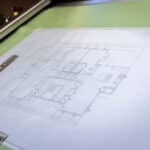 Architectural drawing on a drawing board.