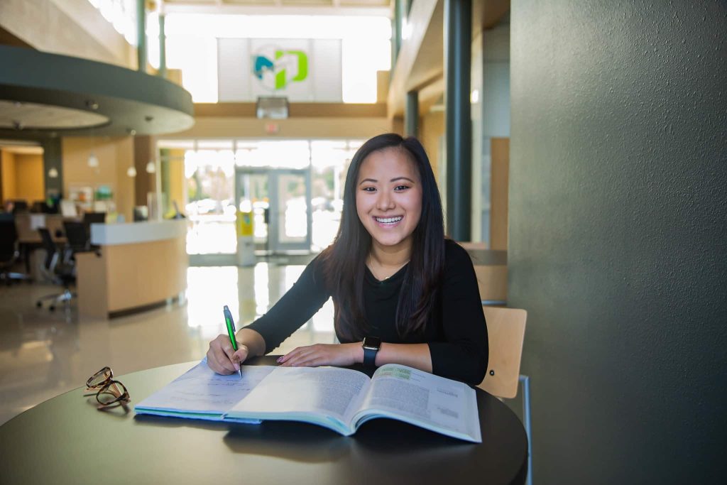 Student sitting at desk and studying