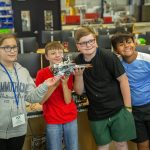 Four students showing