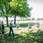Students playing outside in the sun