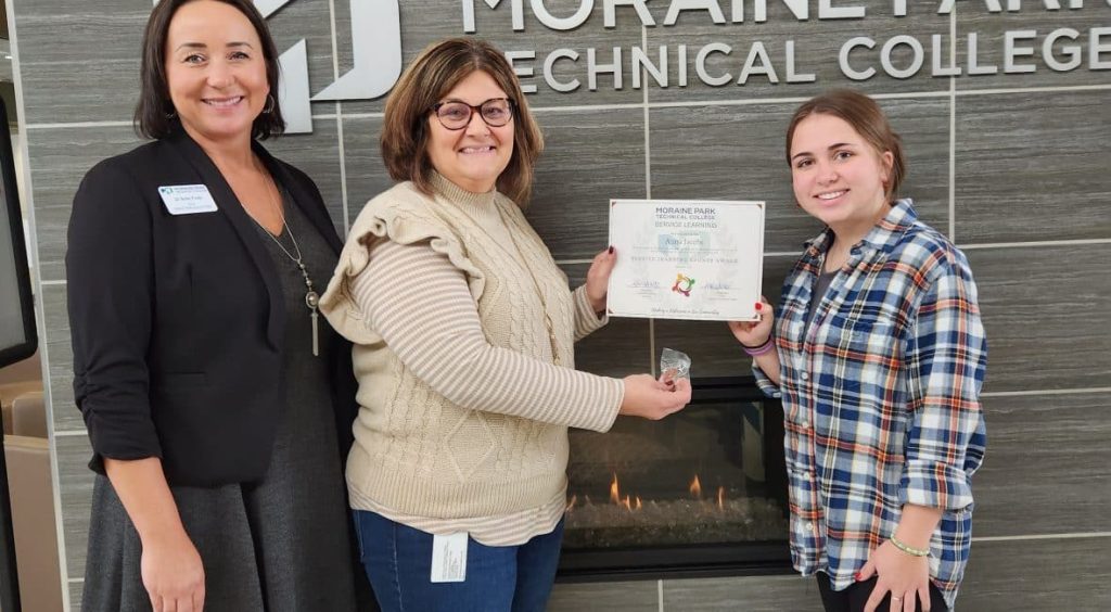 MPTC Dean Dr. Bobbi Fields, Experiential Learning Specialist Kim Spartz and Bronze Community Impact Award Recipient Anna Jacobs