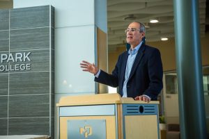 UW-Green Bay Chancellor Michael Alexander speaking at the podium.