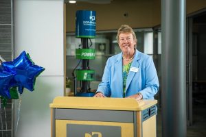 Moraine Park President Bonnie Baerwald speaking at the podium.