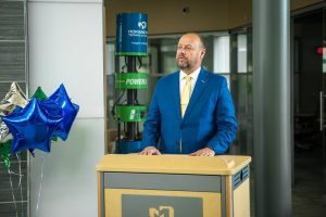 UW Oshkosh Chancellor Andy Leavitt speaking at the podium.