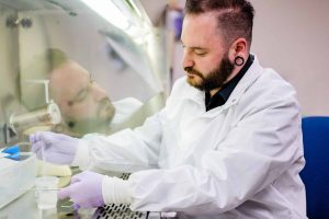 Medical laboratory technician student working in lab