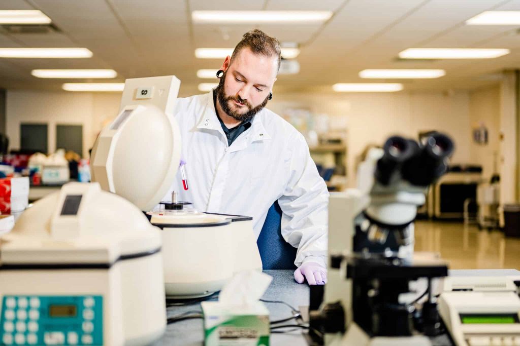 Medical Laboratory Technician program student working in lab