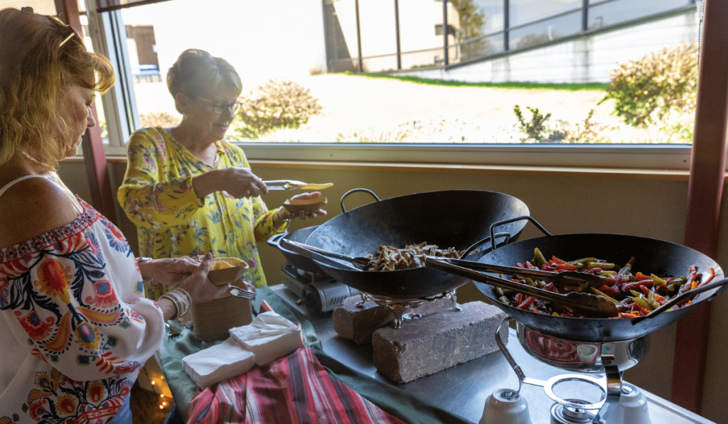 Community members at Taco station