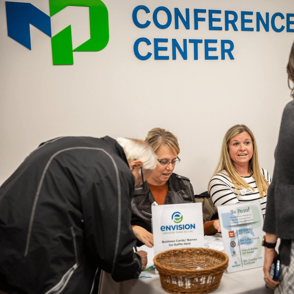 People signing in at the MPTC Conference Center.