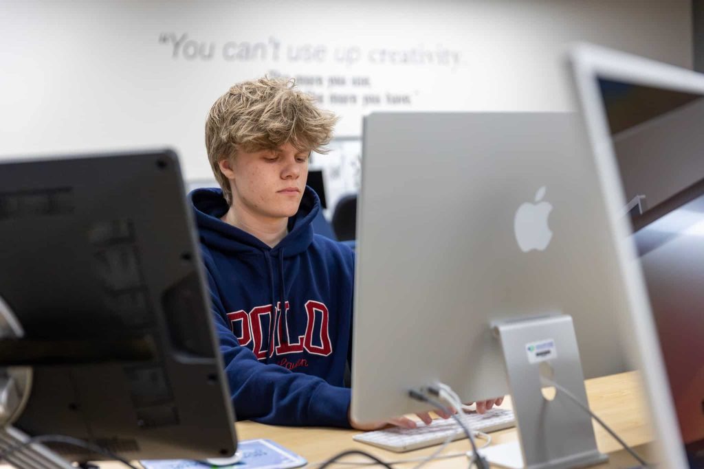 student working on a computer