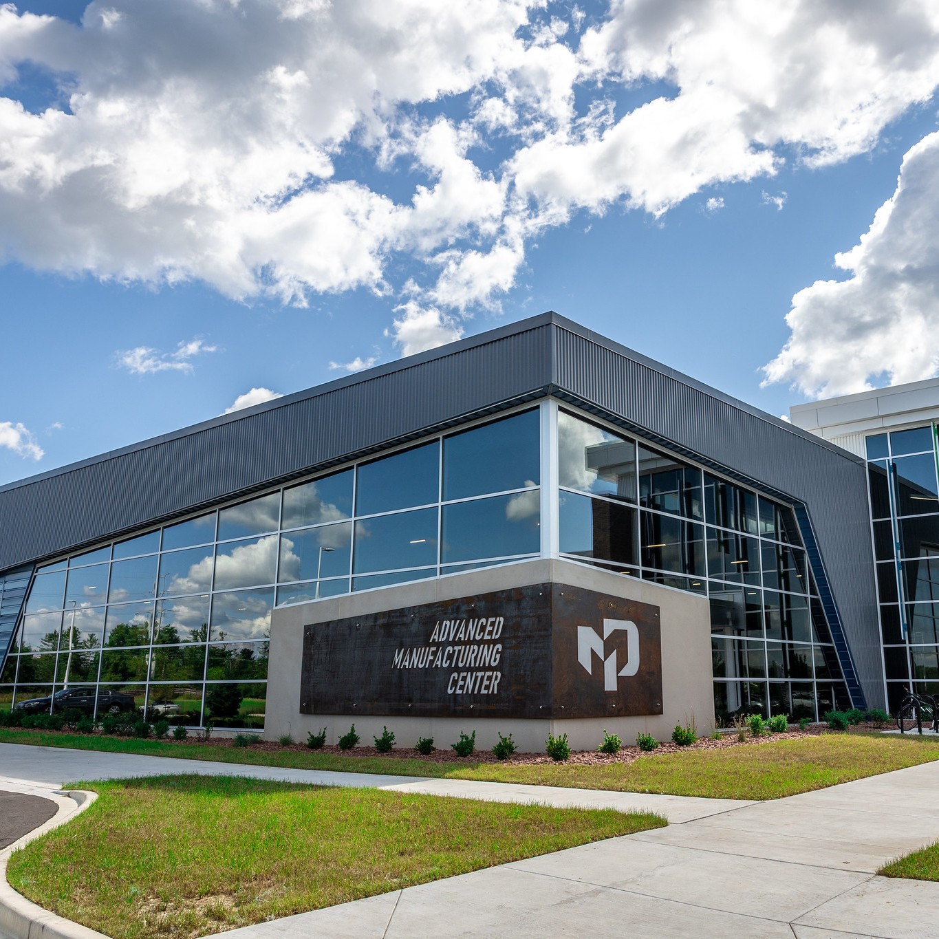 Outside view of Moraine Park's Advanced Manufacturing Center by day.