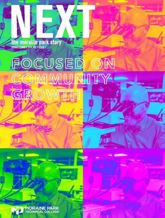 Cover of the Spring/Summer 2024 NEXT Magazine featuring a faculty member looking into a microscope.