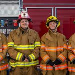High school students wearing fire protection gear during a Moraine Park Career Experience event.