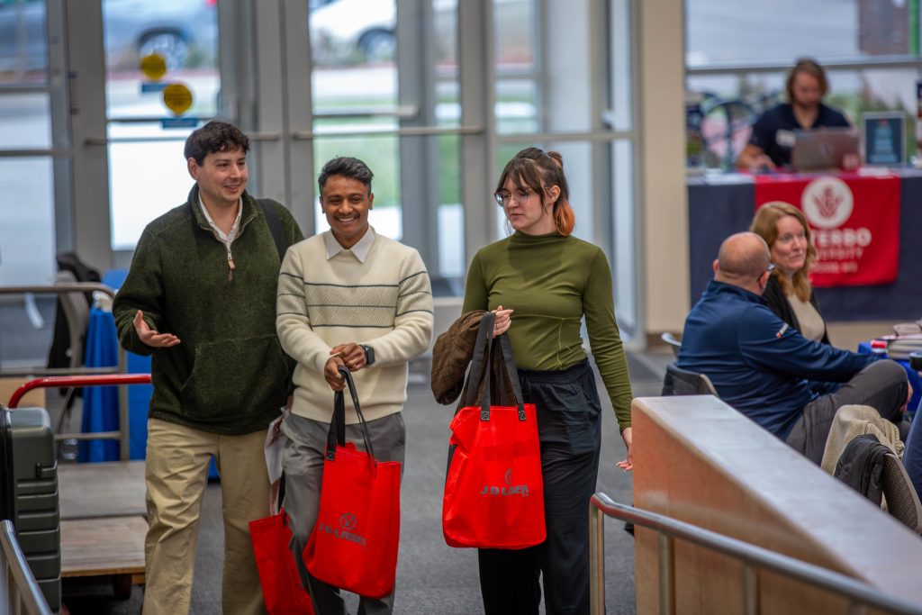 Students and community members happily walking around Future Fair.