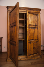 Picture of a wardrobe with one door open