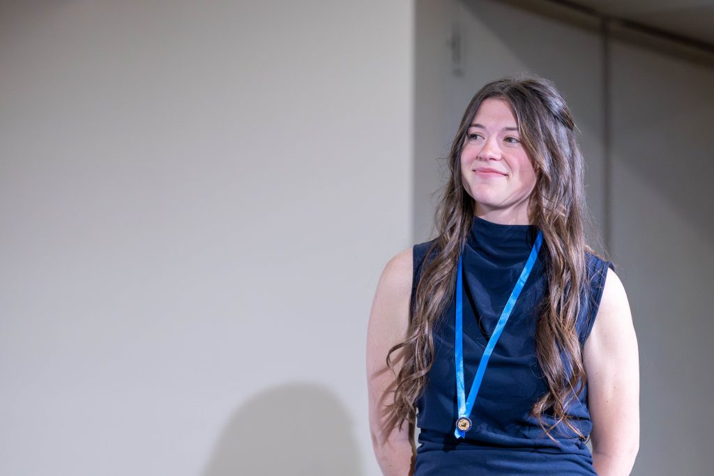 Hannah Lemke smiling on stage.