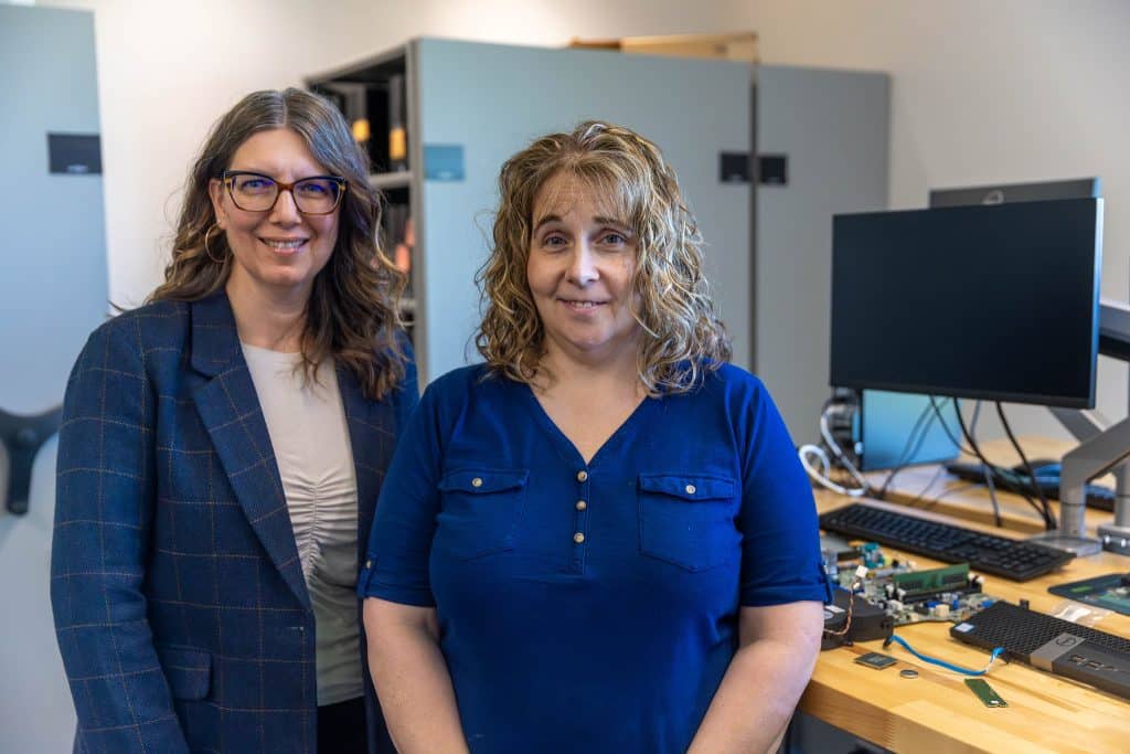 IT Instructor Jennifer Schoonover and student Christy Justman.